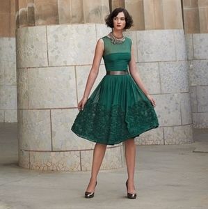 Tiny brand Silk Emerald green dress with applique on skirt.  (Anthropology)